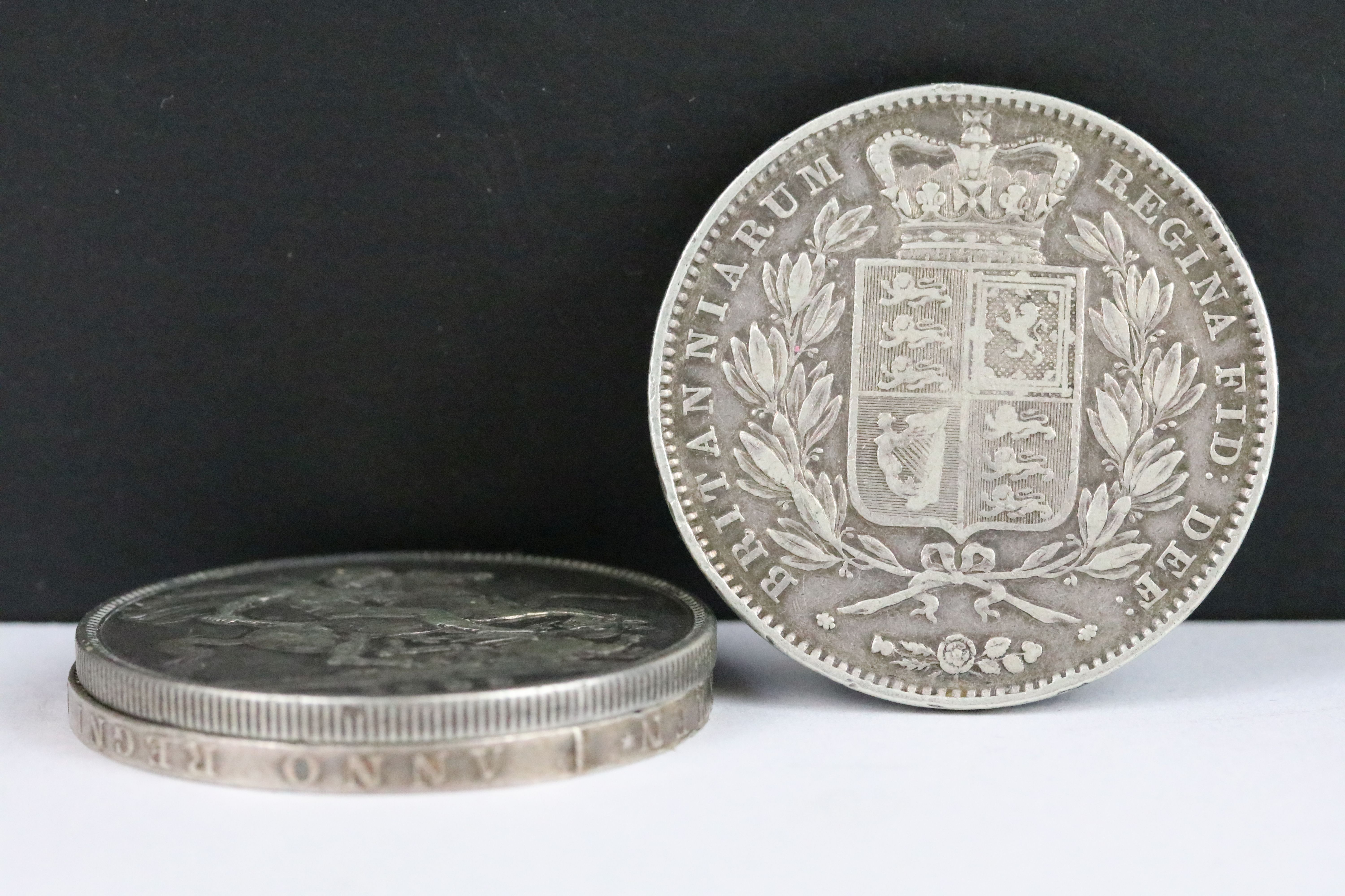 A collection of three British Queen Victoria silver Crown coins to include 1889, 1895 and 1845