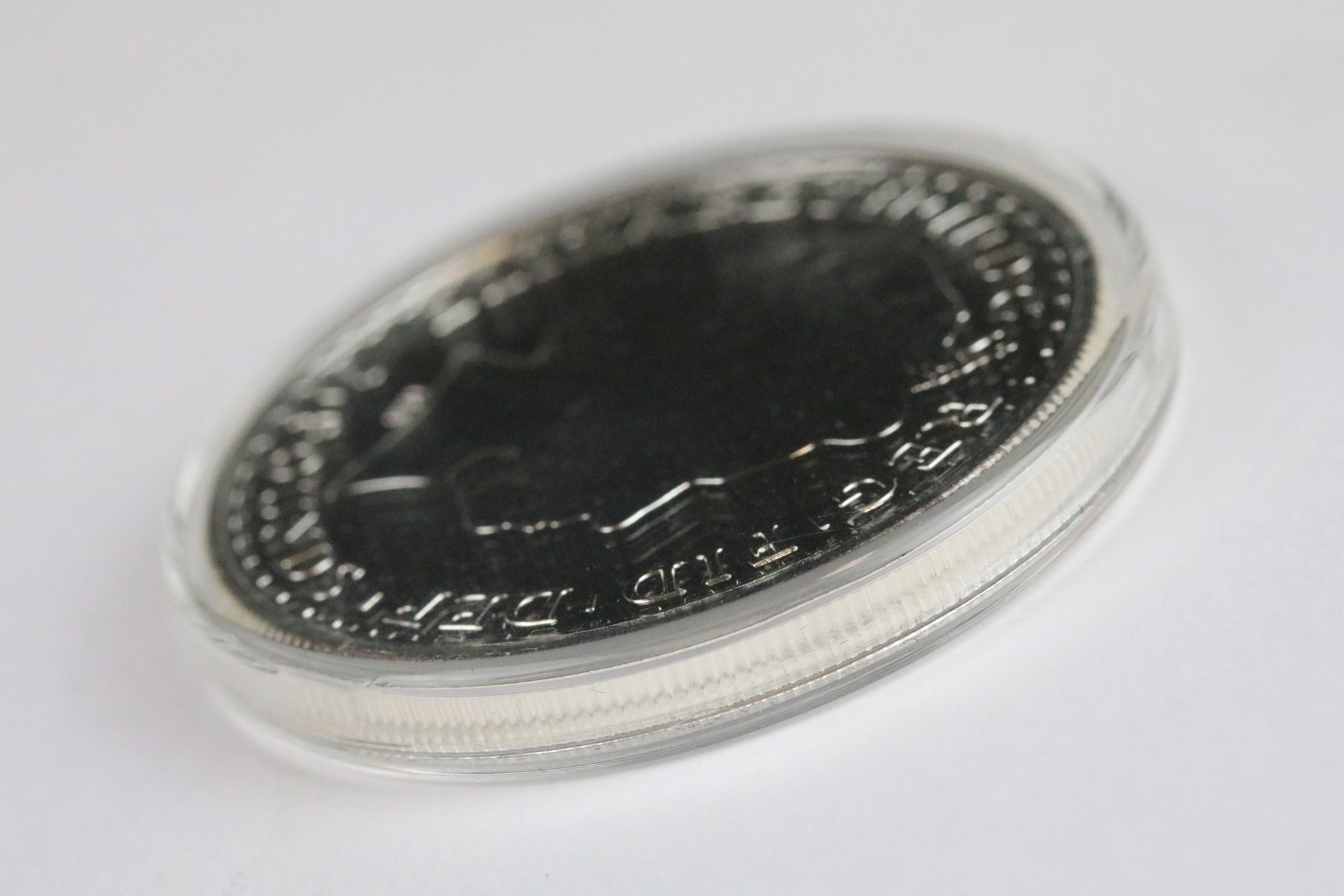 A British Royal Mint uncirculated 2007 Britannia fine silver £2 bullion coin. - Image 3 of 3