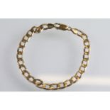 9ct gold hallmarked flat link bracelet chain with lobster clasp. Hallmarked Sheffield. Measures 7.