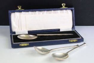 Three silver hallmarked spoons to include a cochlear spoon (hallmarked Birmingham 1978) and a pair