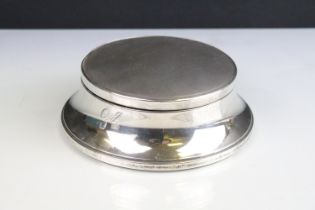 Mid Century silver dressing table box having a domed lid with engine turned detailing on a concave