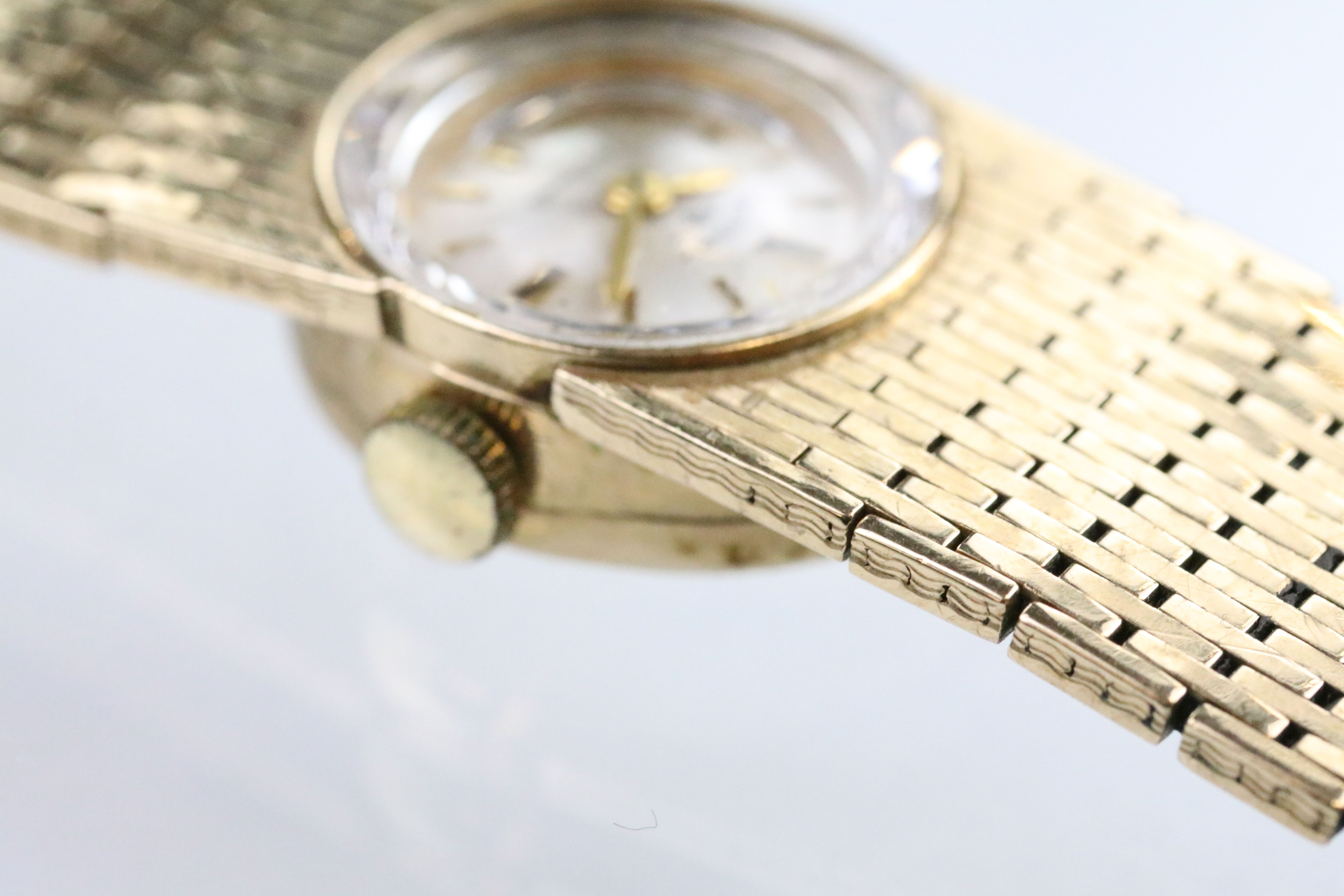 Rotary 9ct gold wrist watch having a round face with baton markers to the chapter ring and faceted - Image 4 of 9