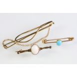 Two antique brooches to include an opal bar brooch and a turquoise safety pin brooch (both