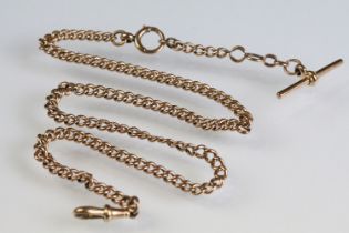 Early 20th Century 9ct gold curb link watch chain having a T bar, dog lead clasp, and spring ring.