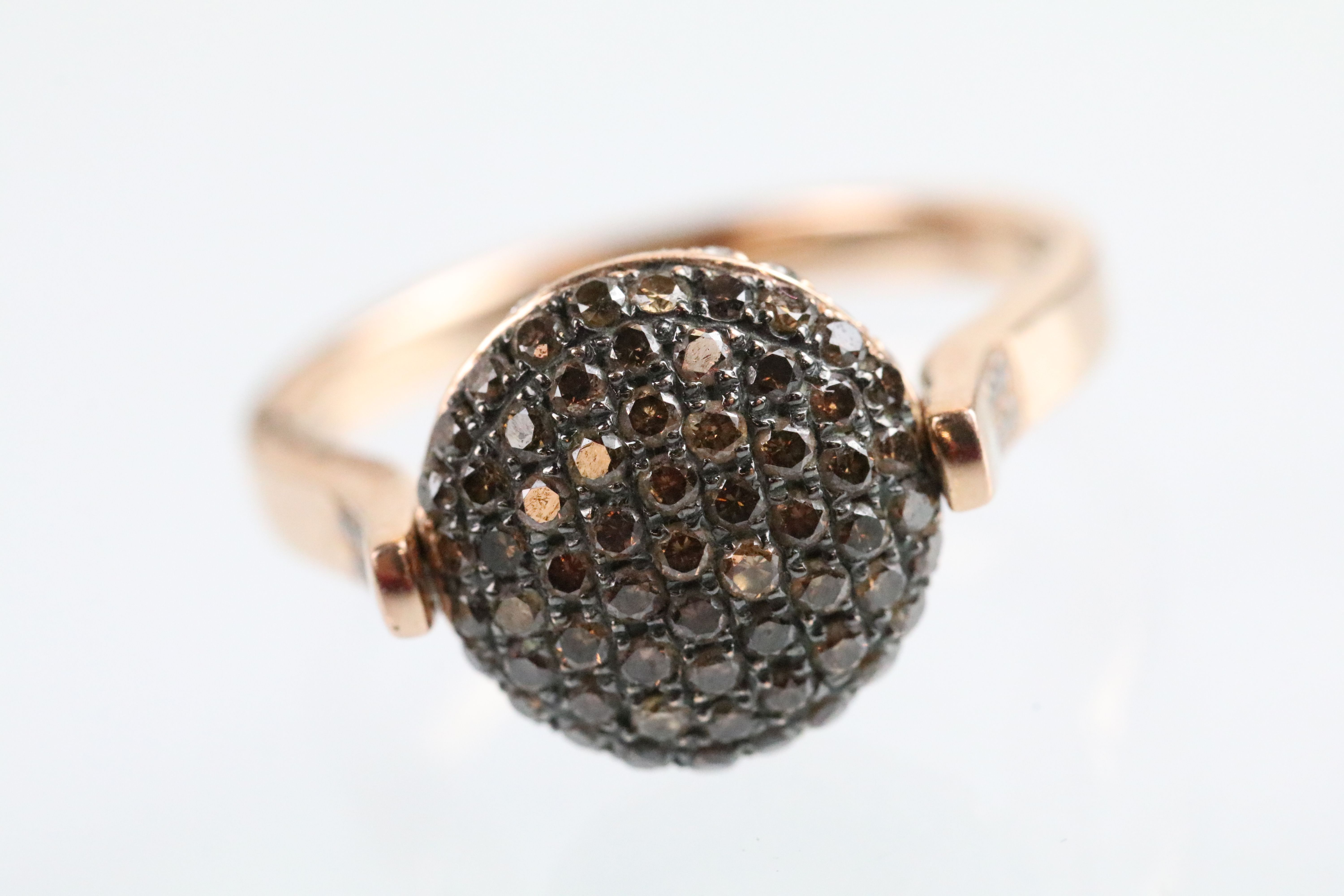 14ct gold and diamond swivel ring. The ring having a round head pave set with round cut diamonds - Image 2 of 5