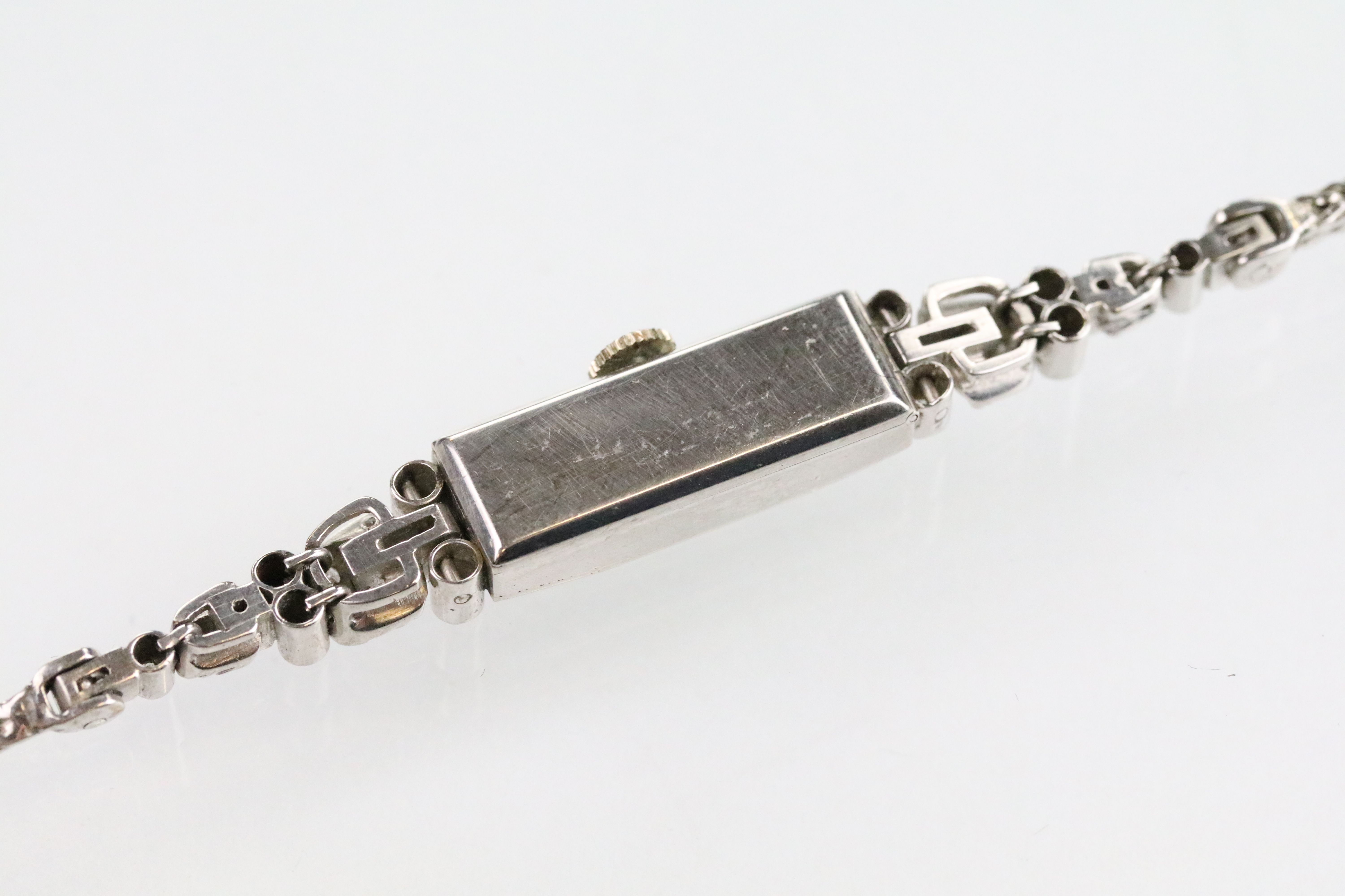 Mid 20th Century platinum, white gold and diamond dress watch. The watch having a rectangular face - Bild 8 aus 11