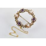 9ct gold amethyst and pearl brooch of round form set with three round cut amethysts and three