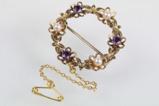 9ct gold amethyst and pearl brooch of round form set with three round cut amethysts and three