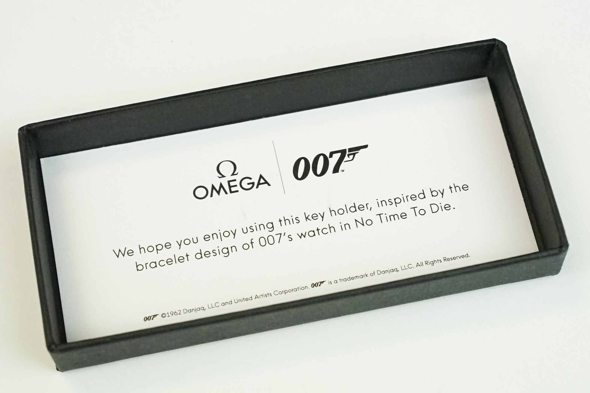 Omega 007 James bond ' No Time to Die' keyring in fitted box with paperwork. - Image 6 of 7