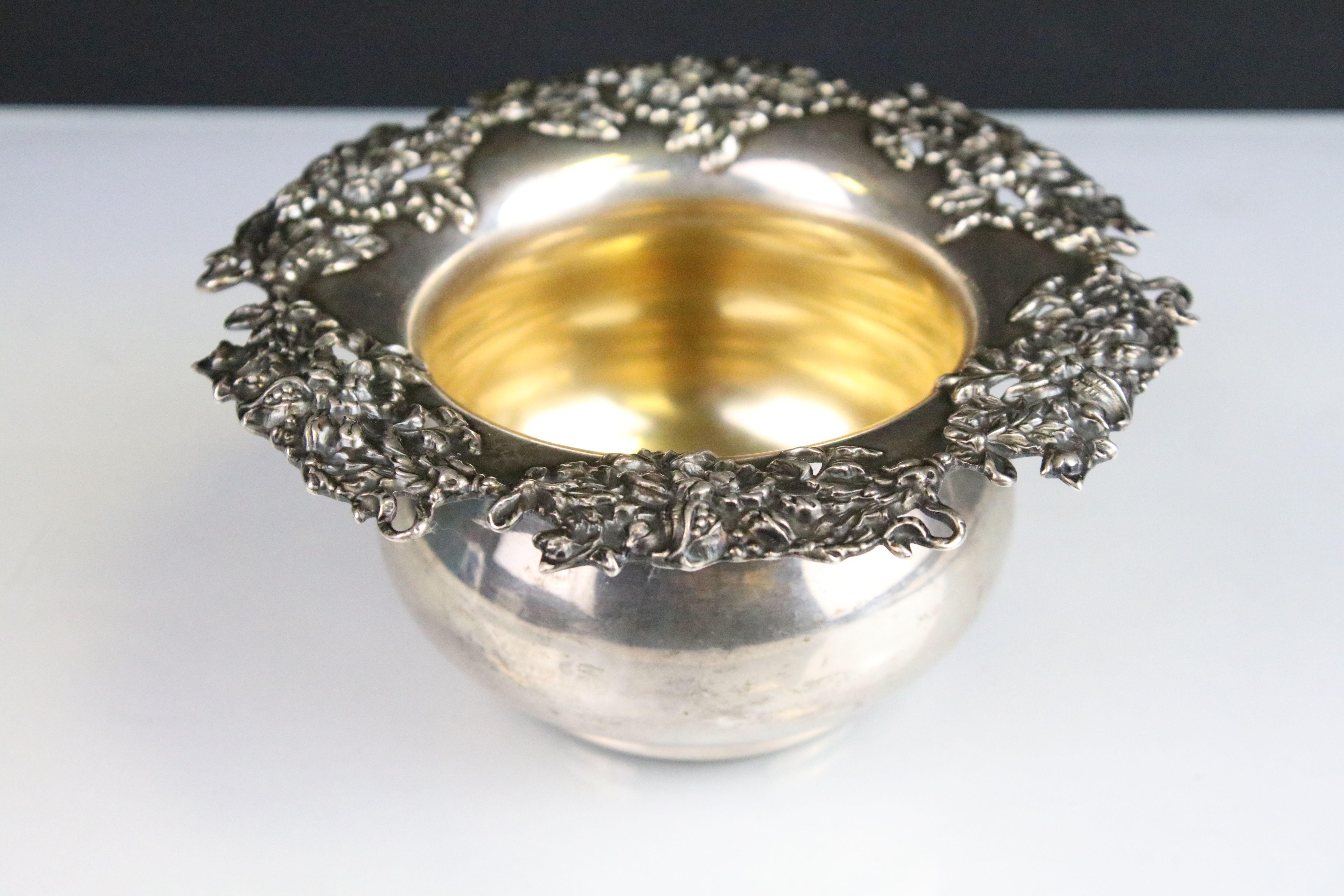 American silver bowl having a moulded floral rim and baluster shaped bowl. Base marked Sterling 925.