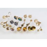 Collection of assorted yellow metal earrings. The lot to include opal doublet stud earrings, citrine