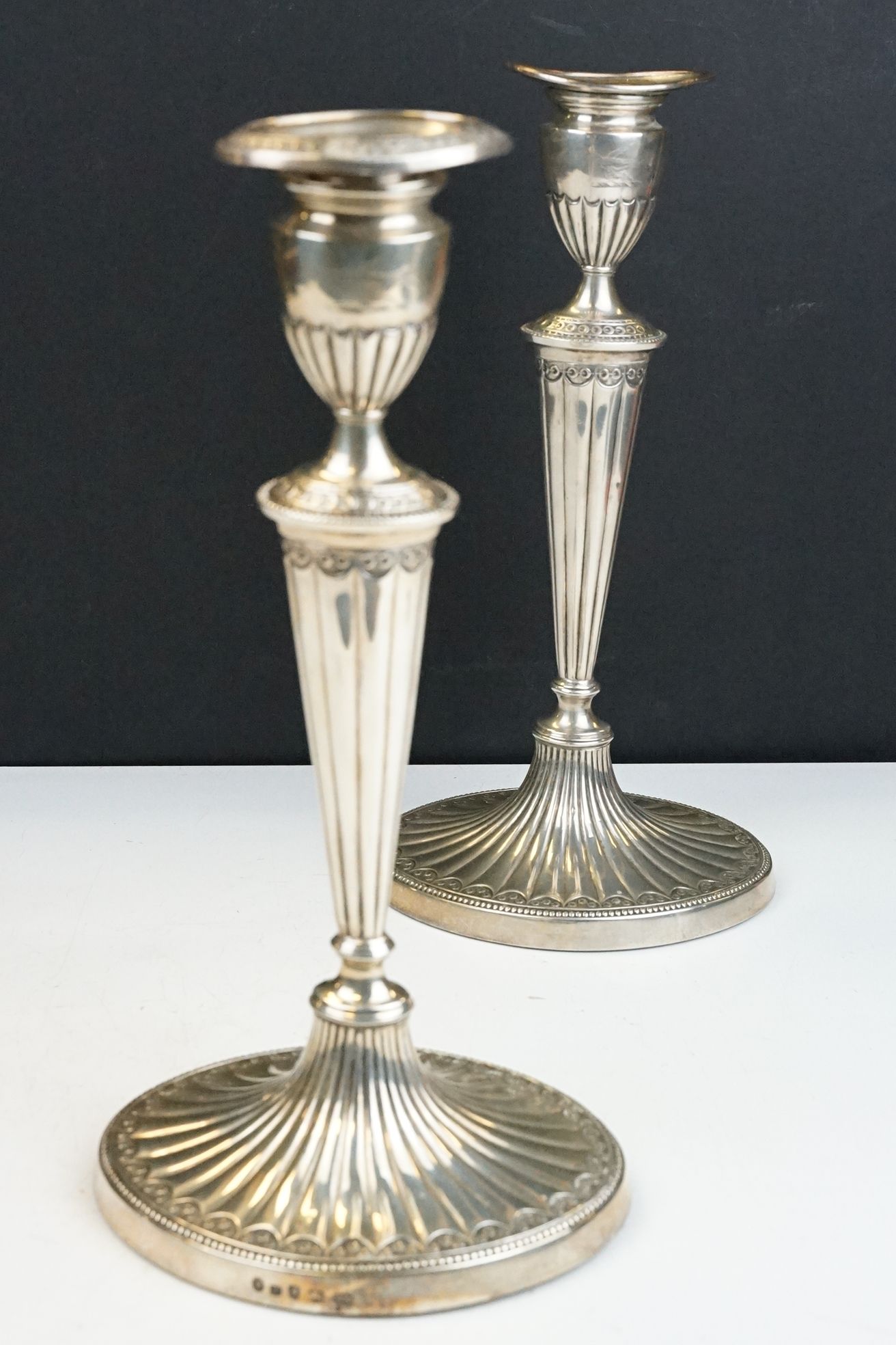 Pair of George III silver hallmarked candlesticks having urn shaped tops with tapering gadrooned - Image 2 of 14