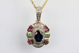 9ct gold sapphire, ruby, emerald and diamond pendant set with an oval cut sapphire to centre