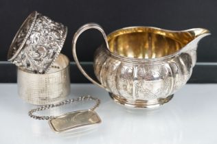19th Century Victorian silver hallmarked cream jug having gadrooned sides footed base and gilt