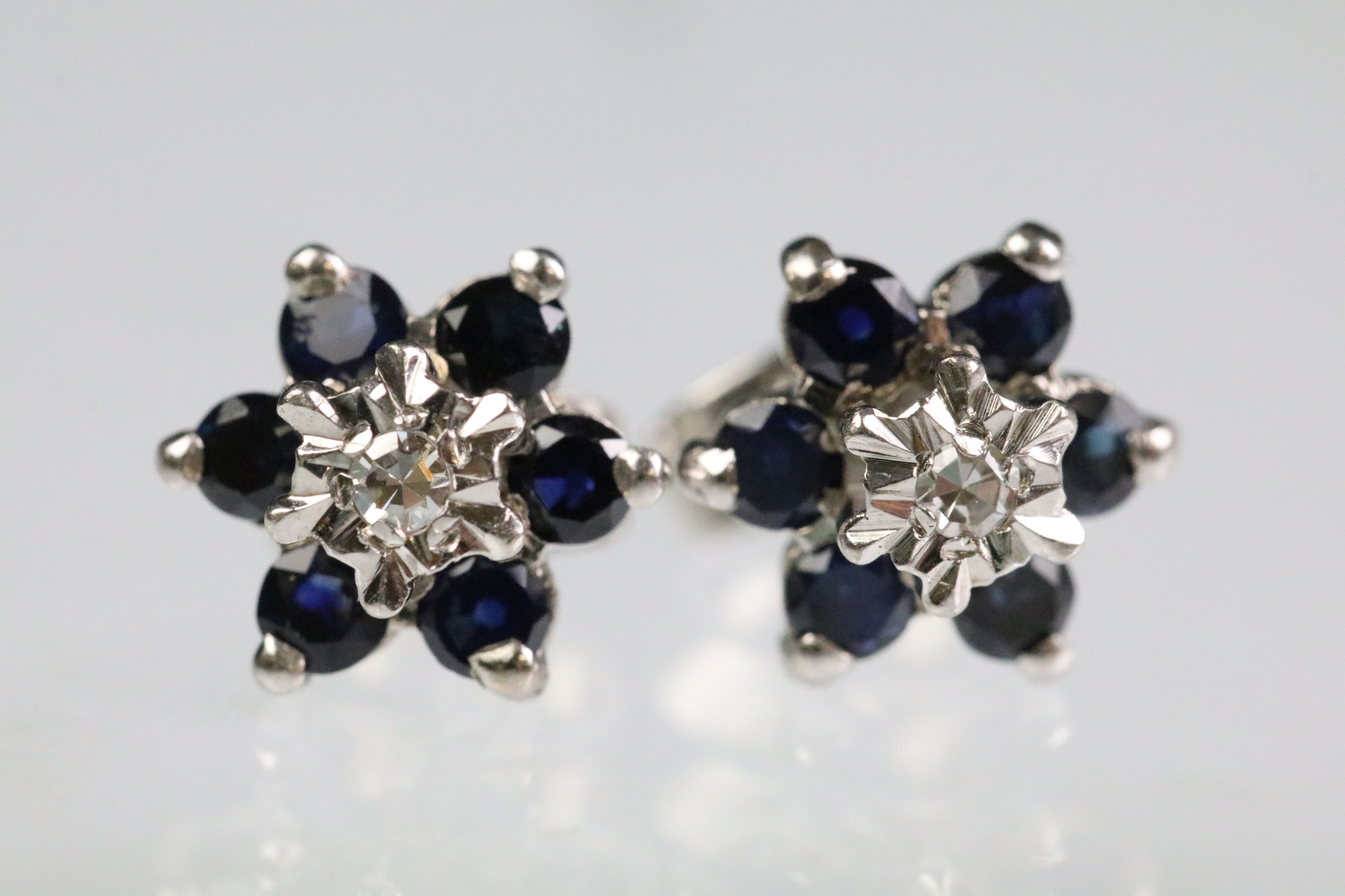 Sapphire and diamond cluster earrings having a central illusion cut diamond to centre with a hao - Image 2 of 3