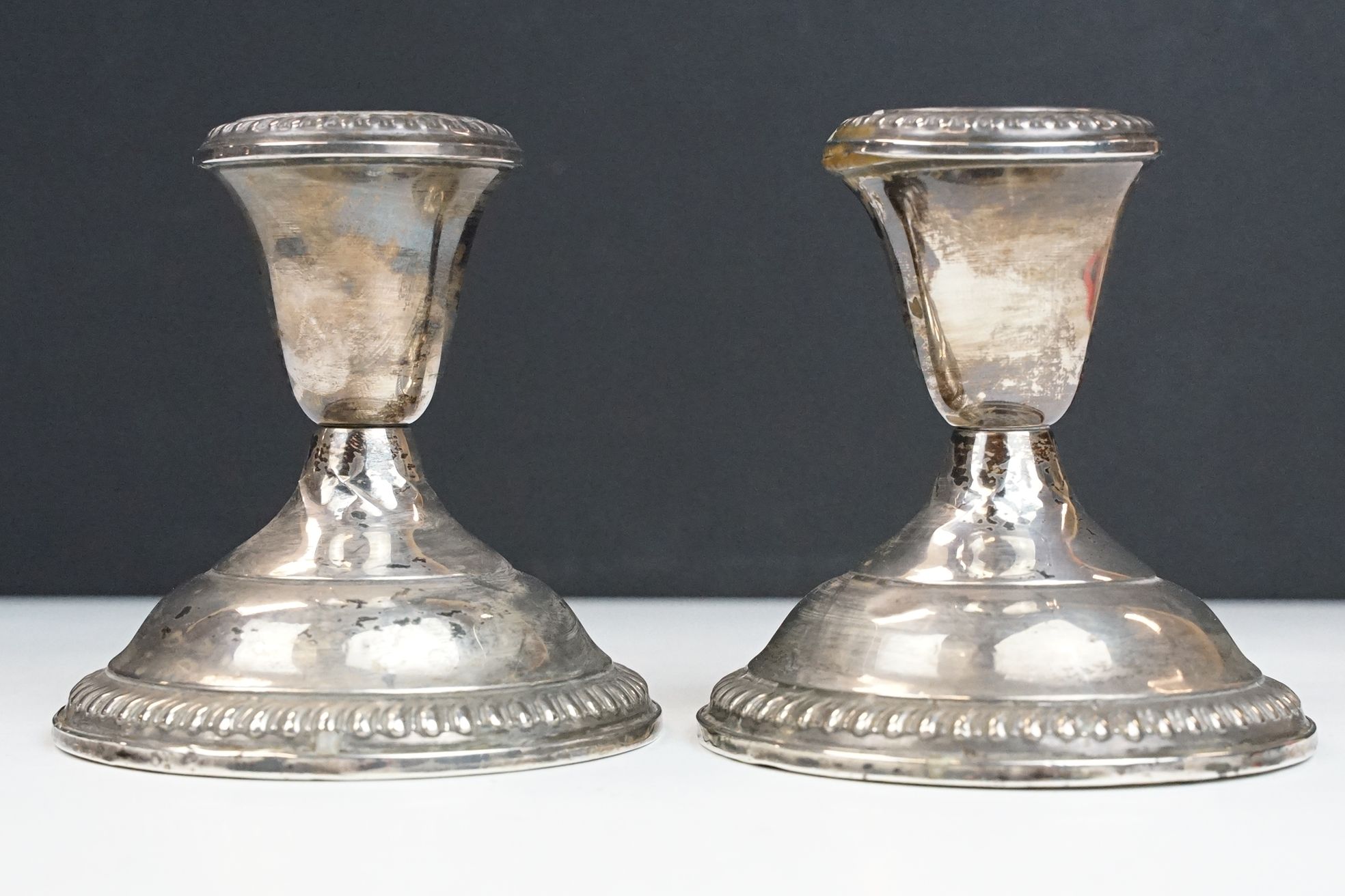 Pair of Empire Sterling weighted candle sticks with gadrooned borders together with a leather box - Image 6 of 9