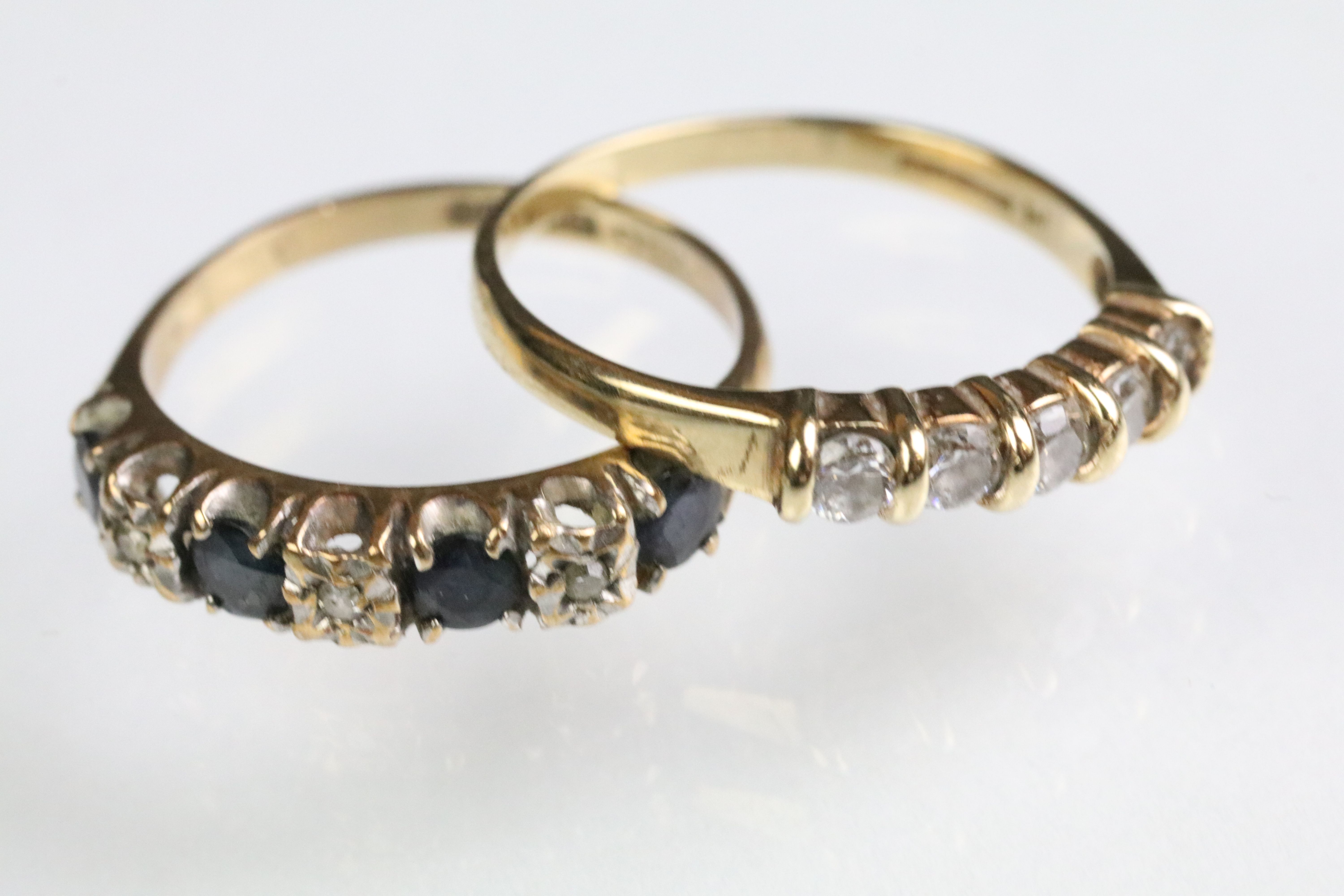 Two hallmarked 9ct gold rings to include a five stone CZ ring (hallmarked Birmingham, size N.5),