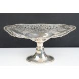 Early 20th Century silver tazza dish having a garlands to the rim raised on a oval footed base.