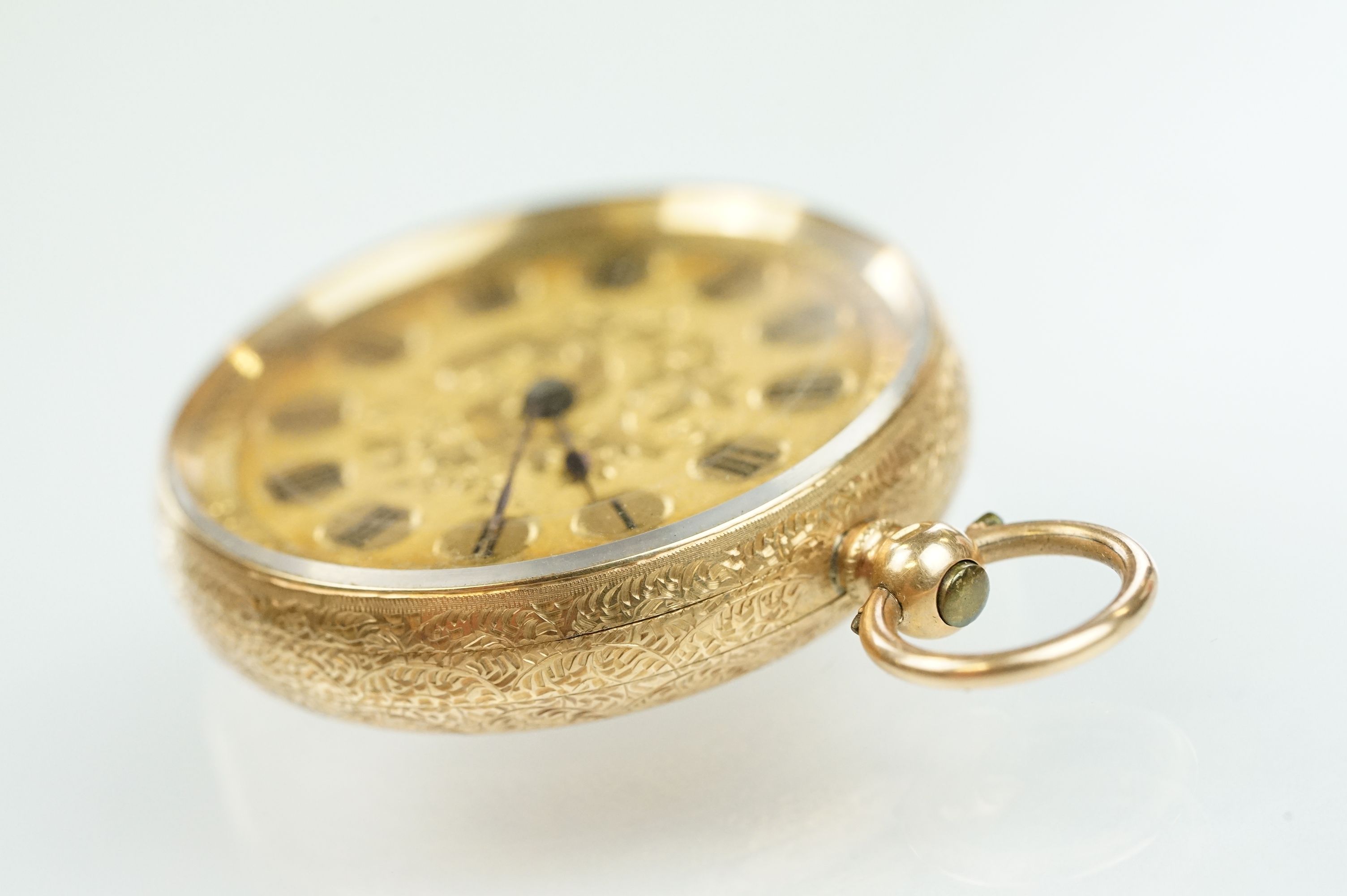 14ct gold open face pocket fob watch having a gilt face with foliate details and roman numerals to - Bild 6 aus 11