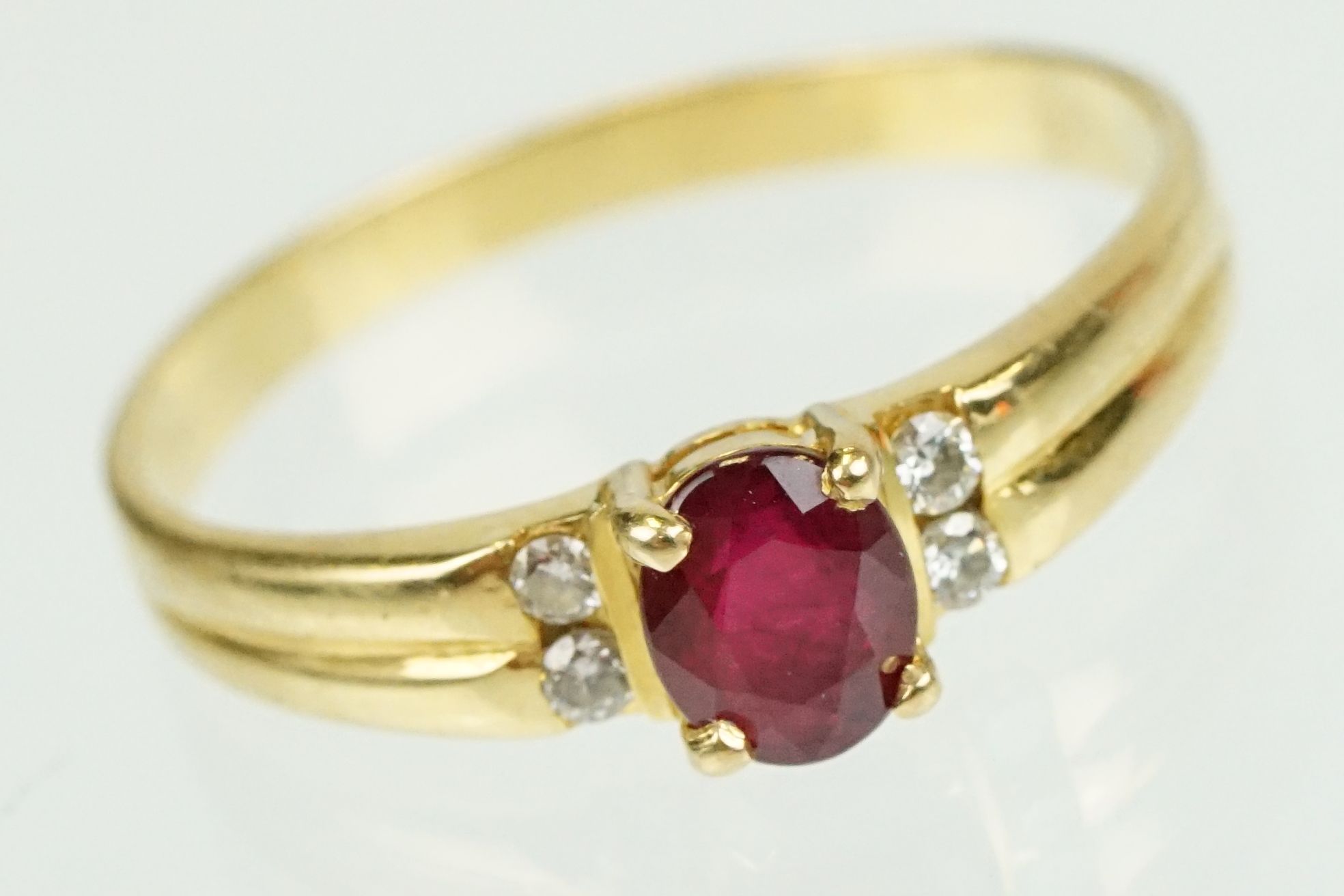 Ruby and diamond 18ct yellow gold ring, the oval mixed cut ruby measuring approx 5.5 x 4.5mm, claw - Image 3 of 23