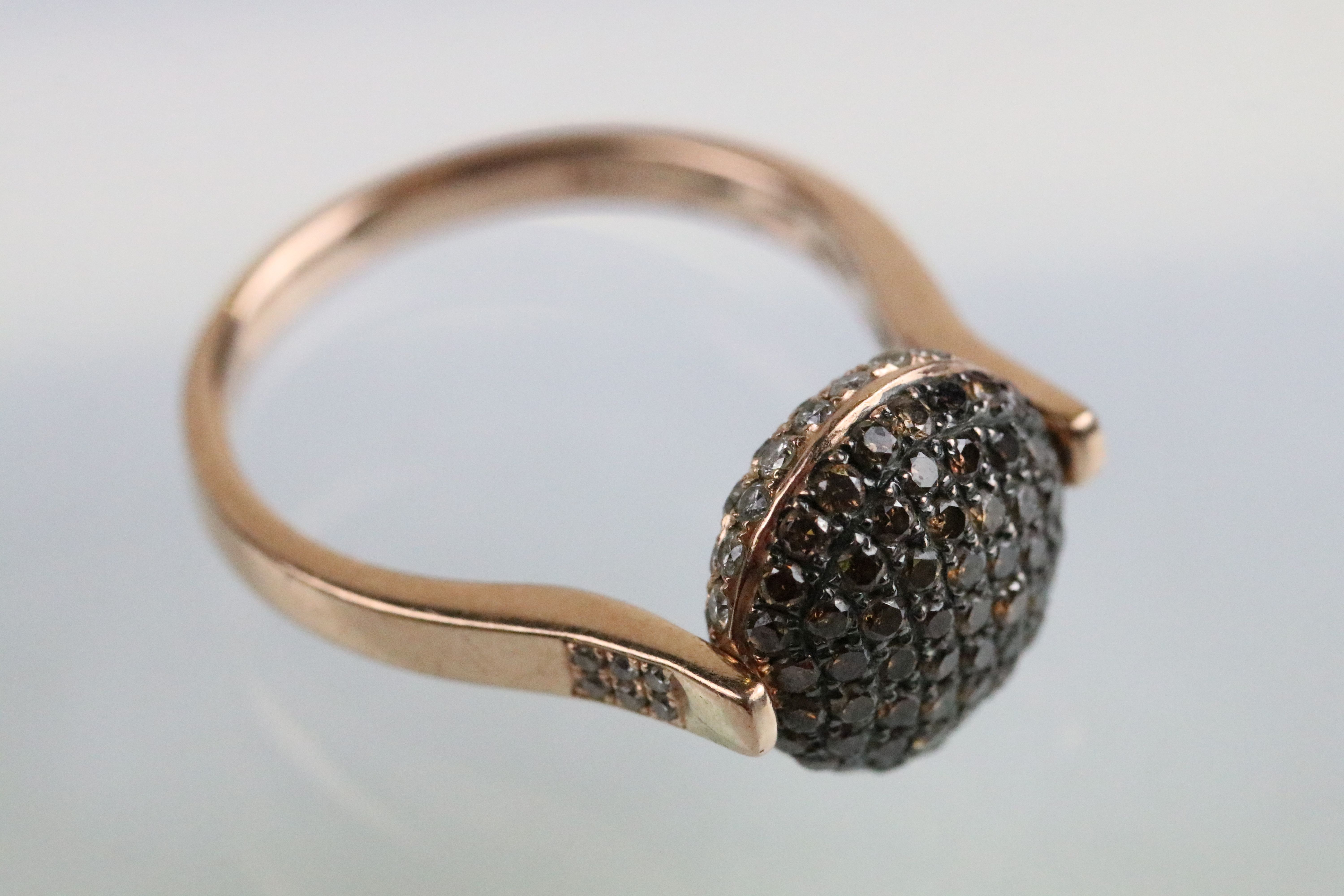 14ct gold and diamond swivel ring. The ring having a round head pave set with round cut diamonds - Image 3 of 5