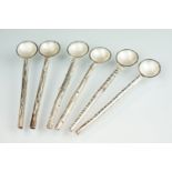 Set of six contemporary style tea spoons having round bowls with twig design handles. Hasllmarked