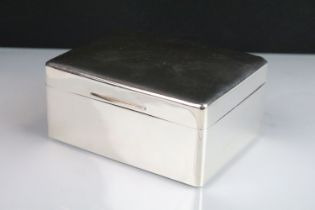 George VI silver cigarette box, of plain polished rectangular form, wooden interior, Wiltshire