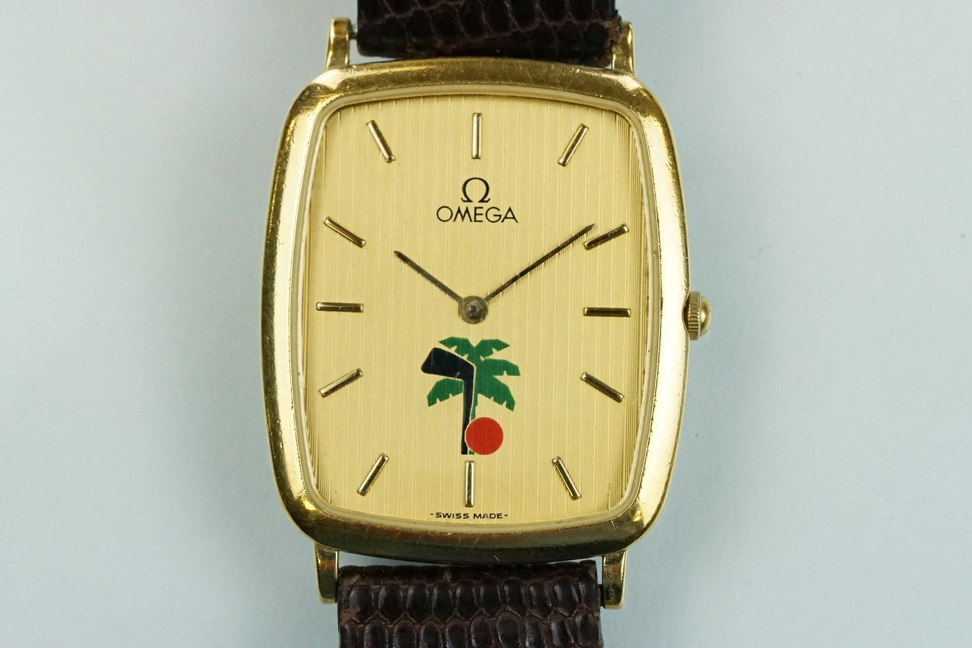 Omega DeVille wrist watch having a rectangular gilt face with baton markers to the chapter ring,