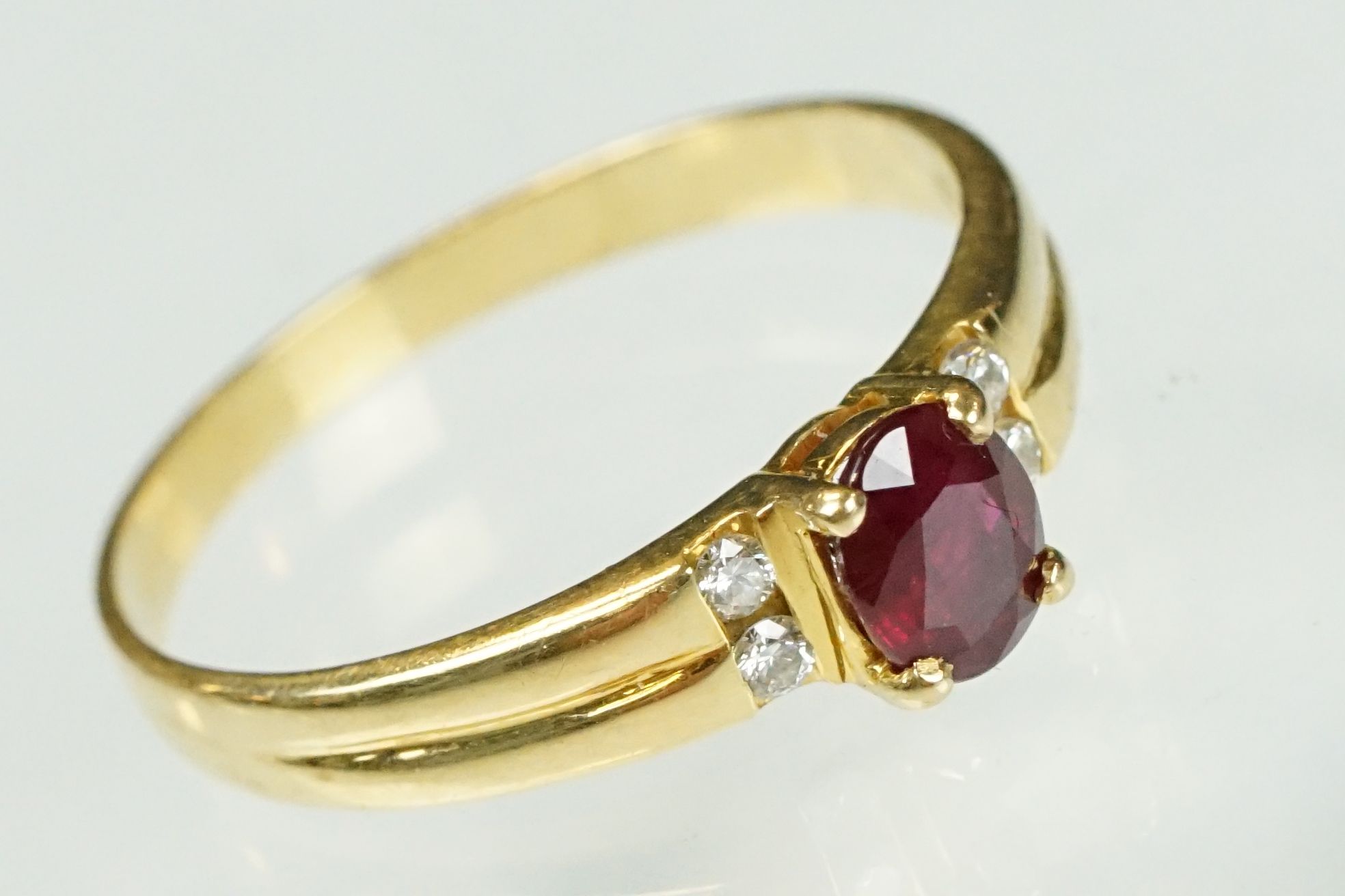 Ruby and diamond 18ct yellow gold ring, the oval mixed cut ruby measuring approx 5.5 x 4.5mm, claw - Image 2 of 23