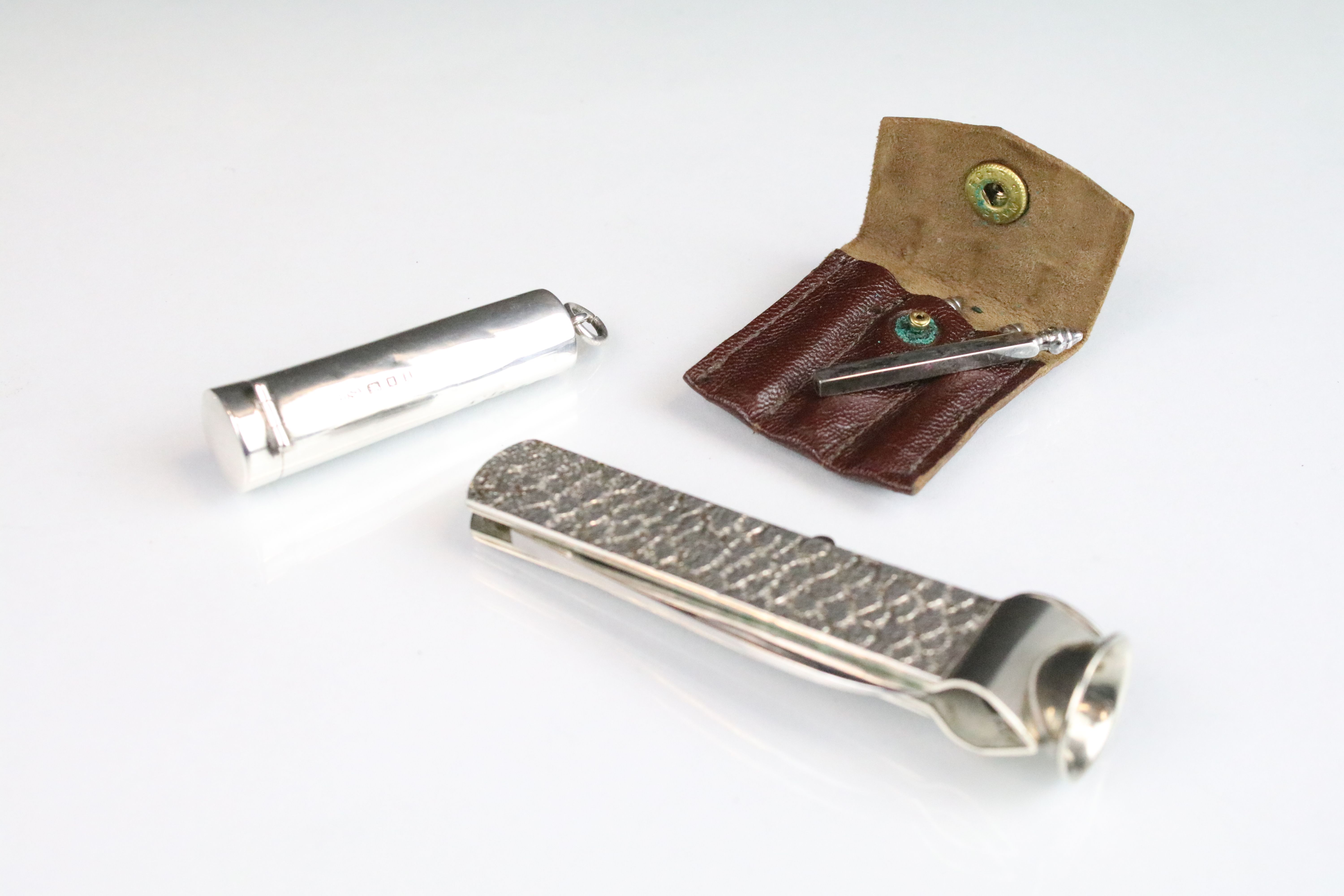 Vintage silver hallmarked cigar cutter having a bark effect body (hallmarked London 1978),