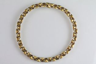 18ct gold Italian necklace chain constructed from interlocking shaped gold panels with a tongue in