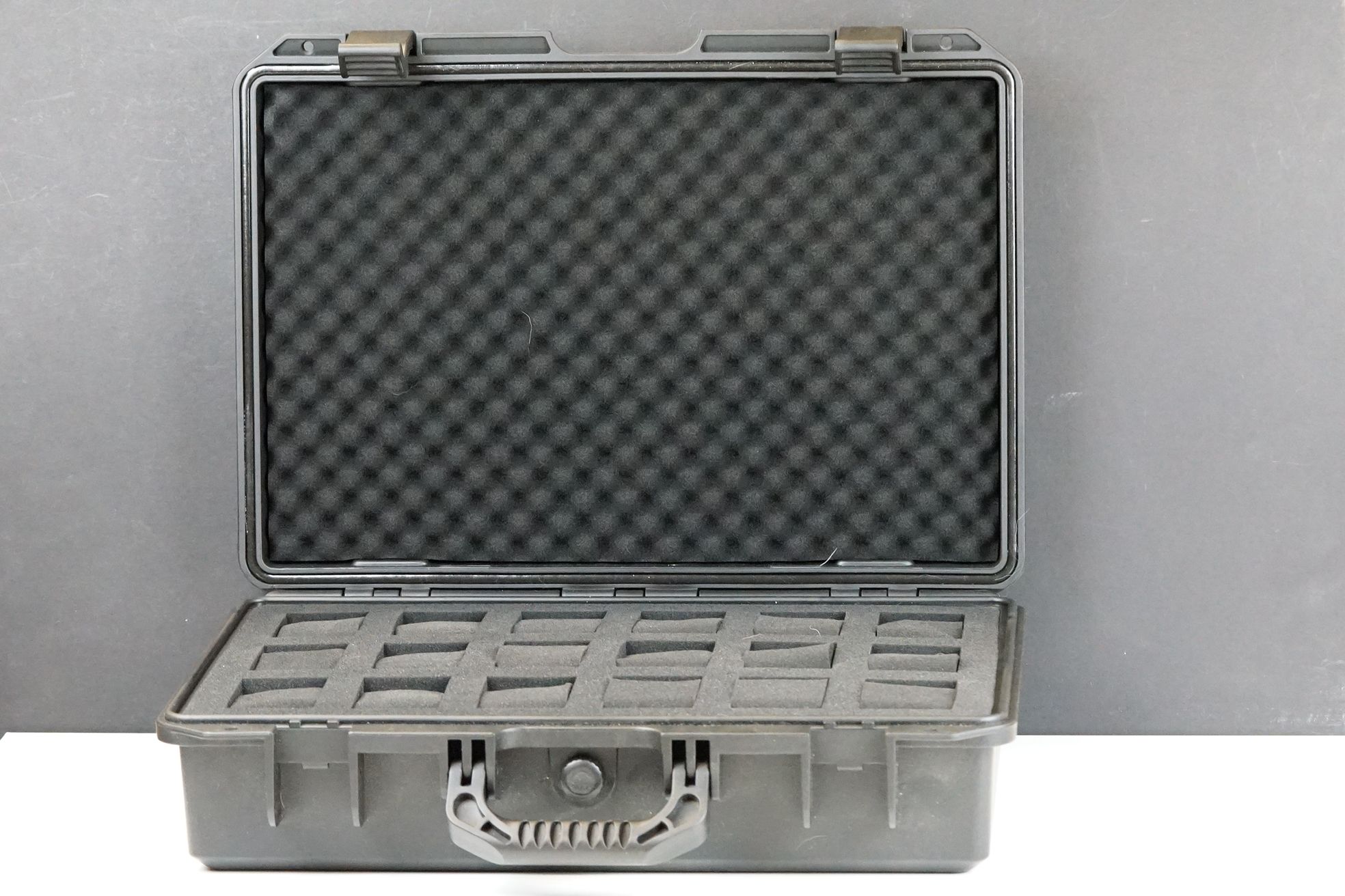 A watch collectors fitted strong case, holds 18 watches within protected foam.