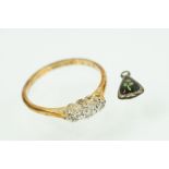 18ct gold and diamond three stone ring. Band marked 18ct. Size O.5.