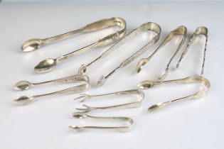 Eight pairs of assorted silver hallmarked sugar tongs, most 19th Century but also including some