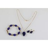 9ct and lapis lazuli necklace, bracelet and earrings. The bracelet set with seven lapis lazuli