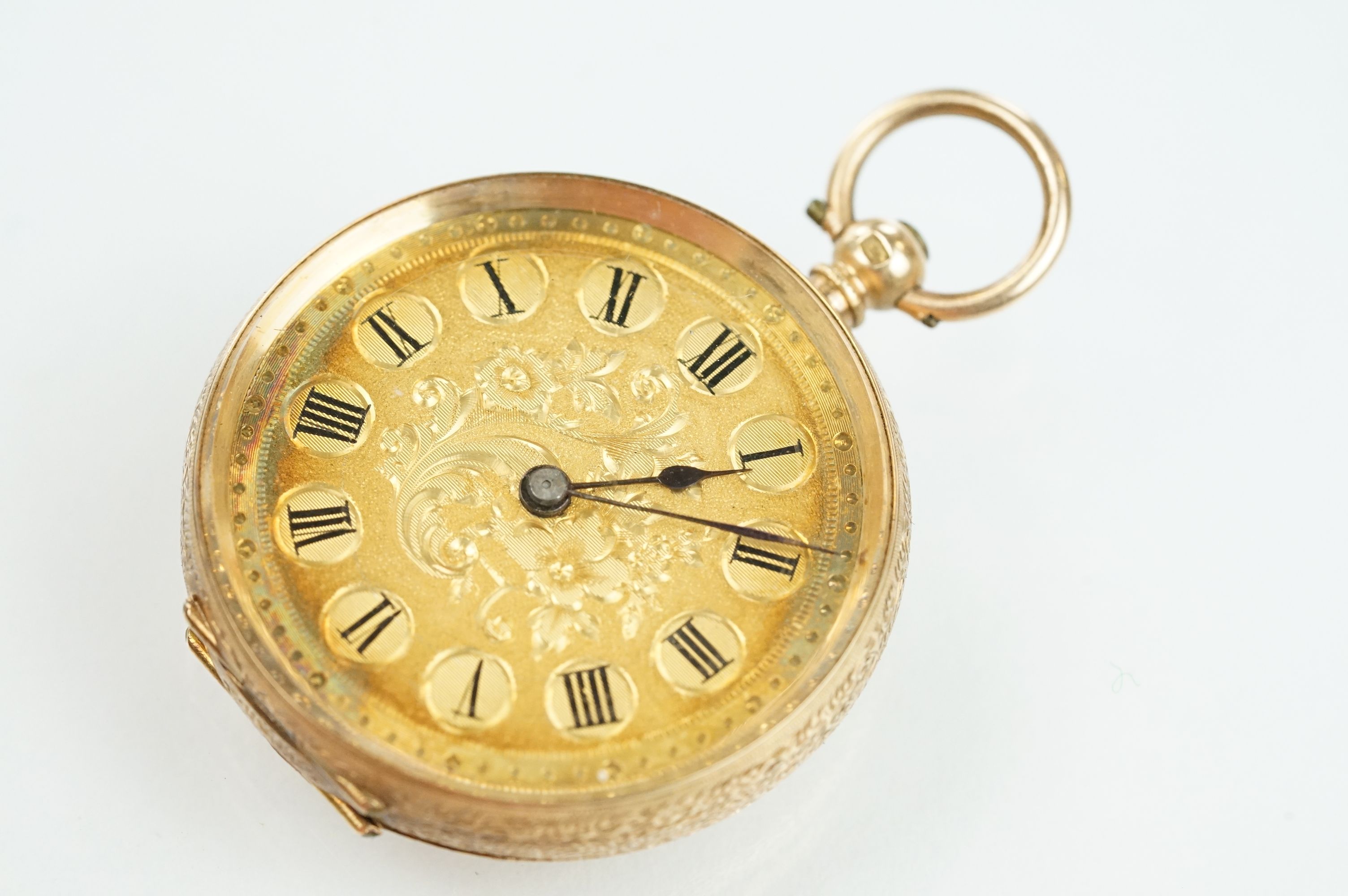 14ct gold open face pocket fob watch having a gilt face with foliate details and roman numerals to - Bild 2 aus 11