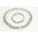 18ct white gold and diamond necklace and bracelet jewellery suite, both having a mesh link chain