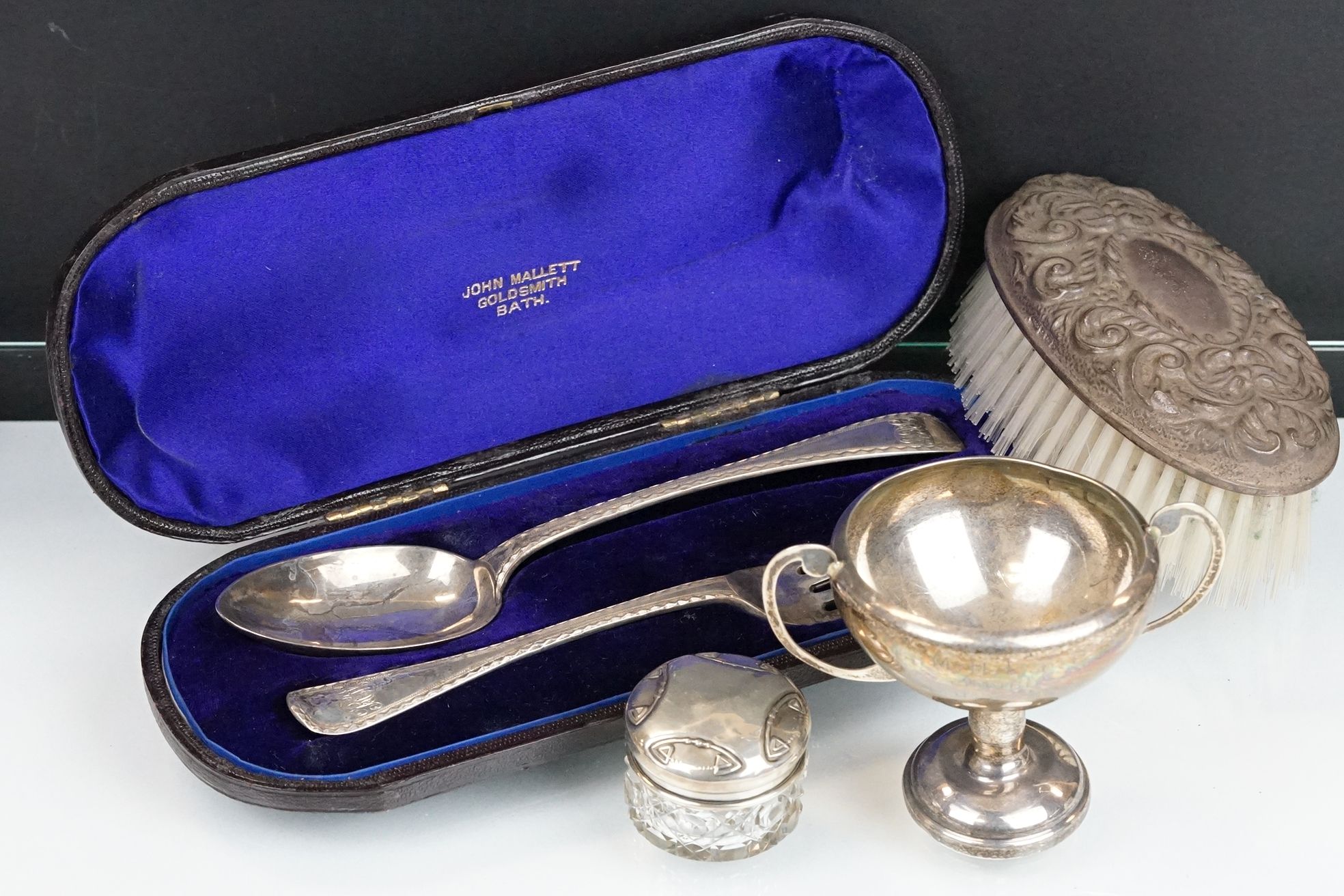 Collection of silver to include a Victorian Francis Higgins II silver spoon and fork presentation