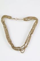 Early 20th Century 9ct gold four chain necklace having four fancy chains suspended from bars with