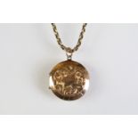 Early 20th Century 9ct gold back and front locket set to a 9ct gold oval link chain with cylinder