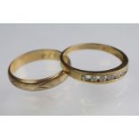 Two 9ct gold rings to include a 9ct gold and cz seven stone ring (import marked 1991, size O.5)