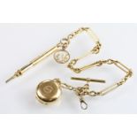 18ct gold figaro link pocket watch chain complete with T bar and spring ring clasp, mounted with