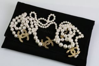 Chanel - simulated pearl CC necklace having gold tone double C's set with pearls with a signed