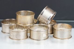 Set of eight silver hallmarked napkin rings by Harman Brothers. Hallmarked Birmingham with