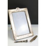 Silver fronted photo frame with floral garland detailing (hallmarked Birmingham 1910), silver