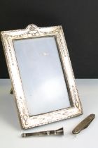 Silver fronted photo frame with floral garland detailing (hallmarked Birmingham 1910), silver