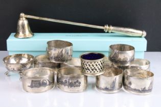 Collection of white metal niello middle eastern napkin rings featuring ship and camel scenes
