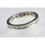 Diamond eternity ring being set throughout with round single cut diamonds. White metal unmarked,