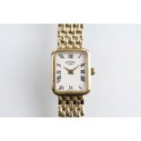 Rotary 9ct gold ladies wrist watch having a rectangular face with roman numerals to the chapter ring