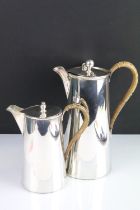 Early 20th Century silver hallmarked coffee pot having moulded rim with wicker handle (hallmarked